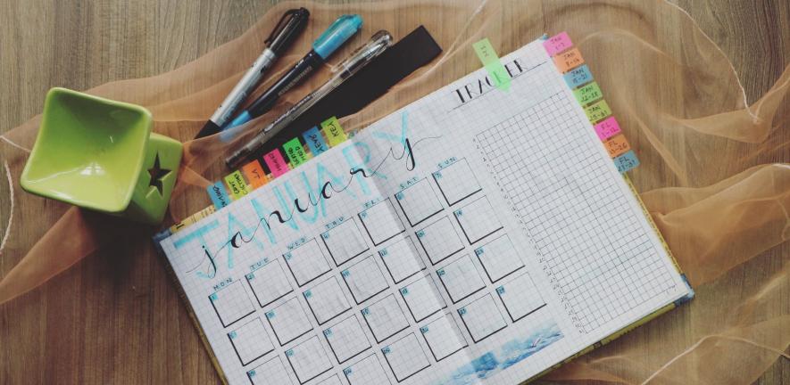 An open calendar with highlighted dates